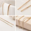 Silver needle gold long tassel earrings